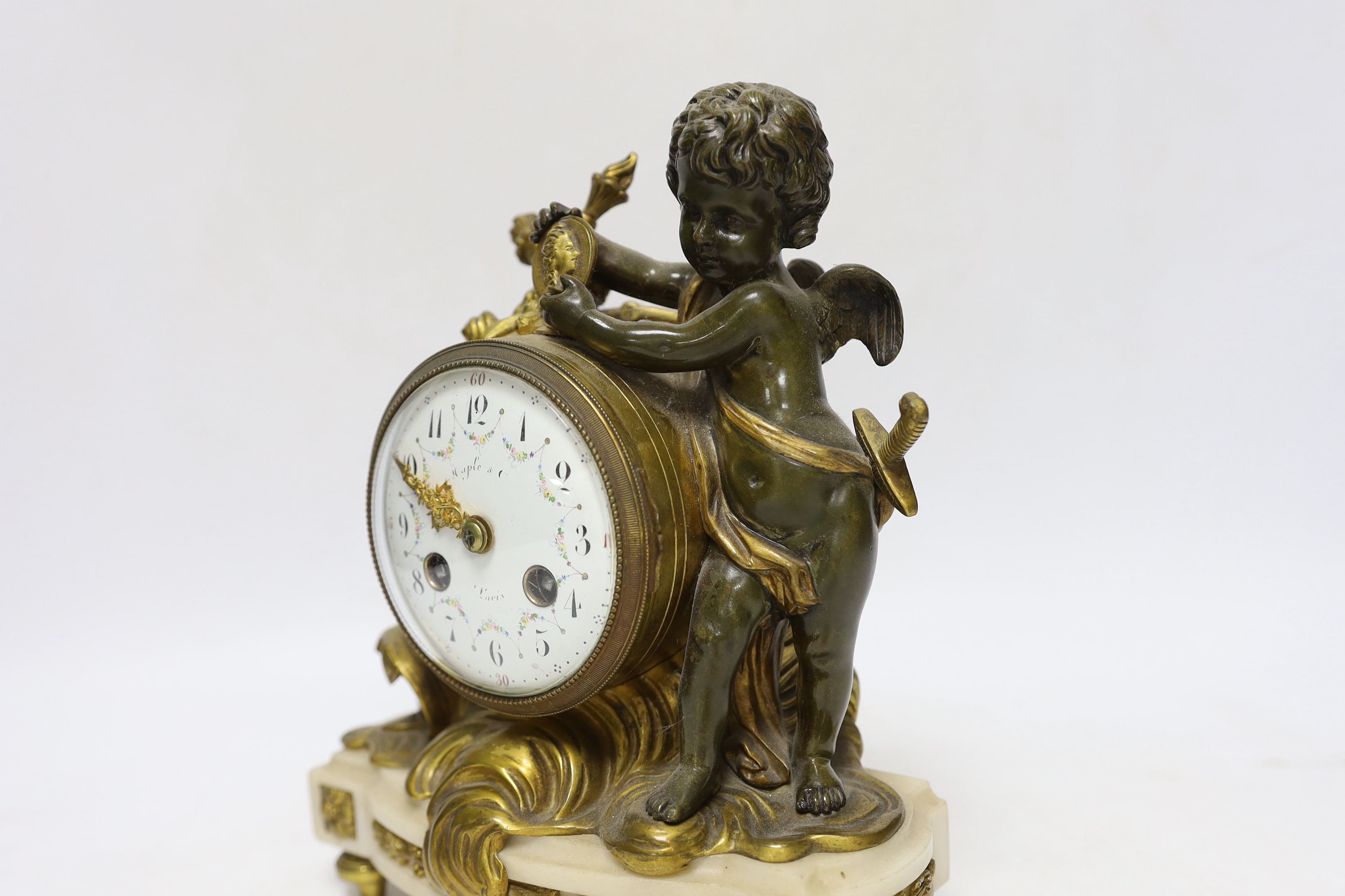 A French ormolu and bronze mantel clock striking on a bell, 22cm high